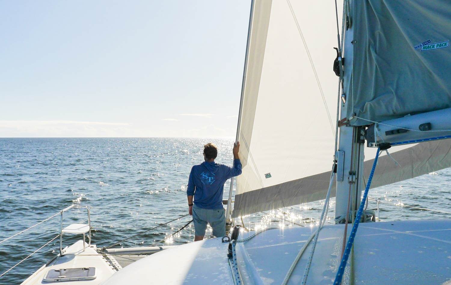 Lagoon 380 under sail with Sunnyside captain on the bow