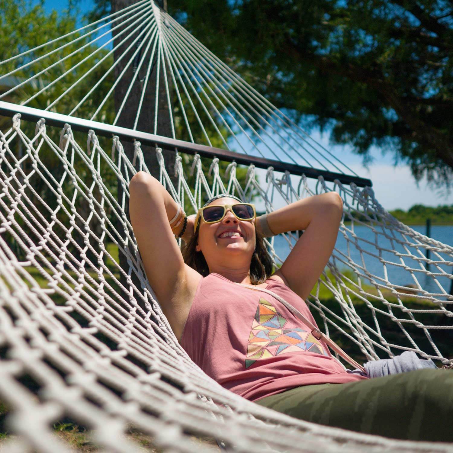 woman in hammock free of cluttered closet