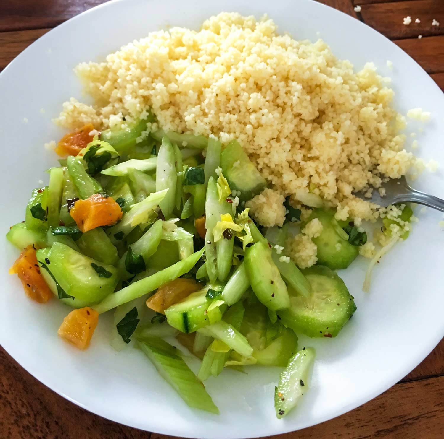 dinner of veggies and couscous on plate