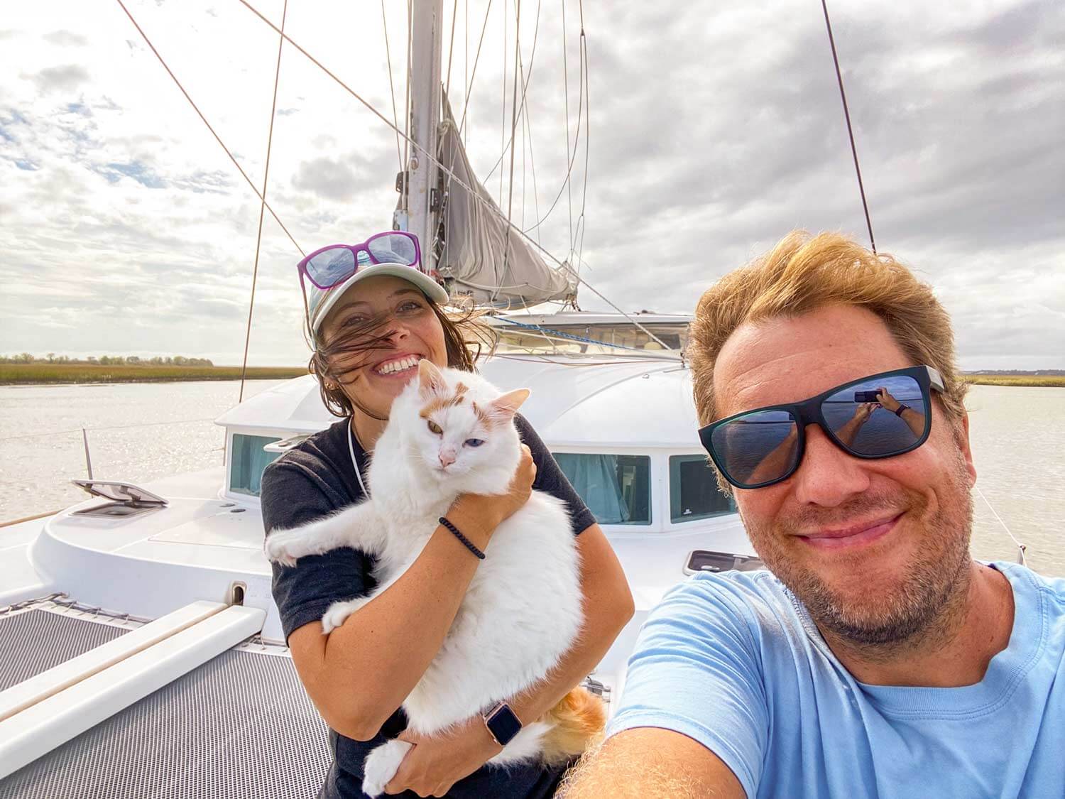 Crew members of SV Sunnyside on the bow of the boat