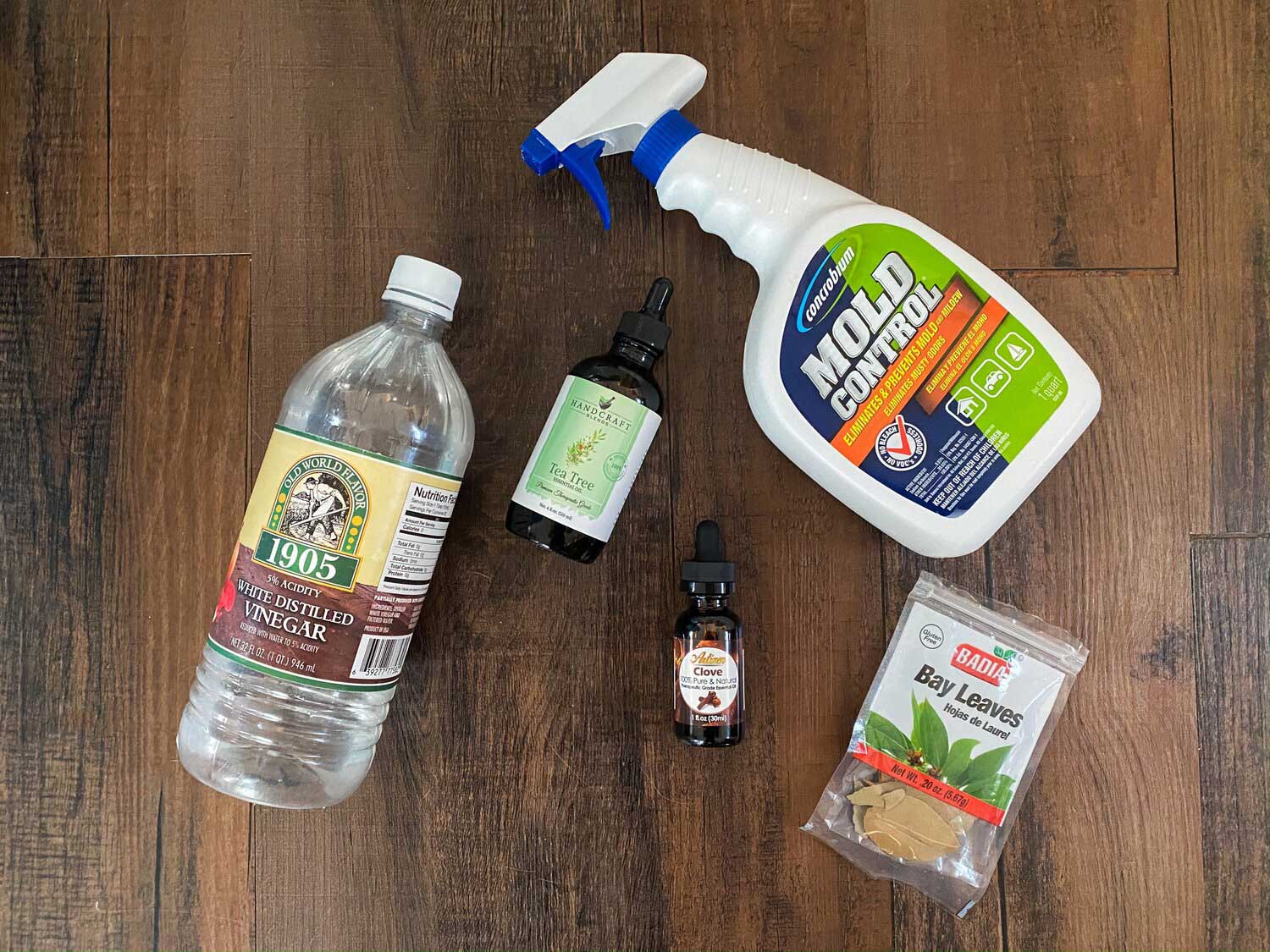 "Vinegar, mold control spray, bay leaves, and essential oils