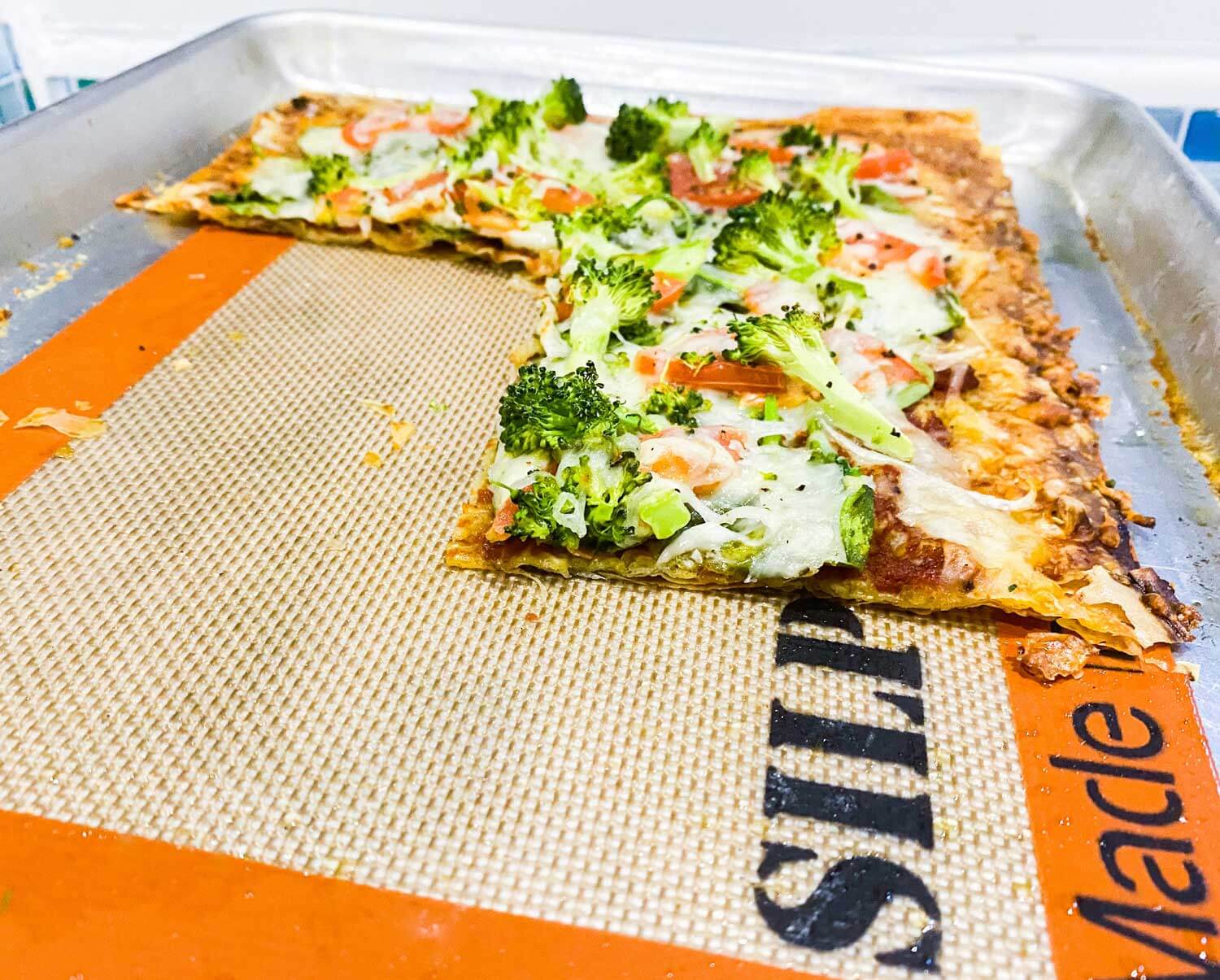 pizza on non-stick mat