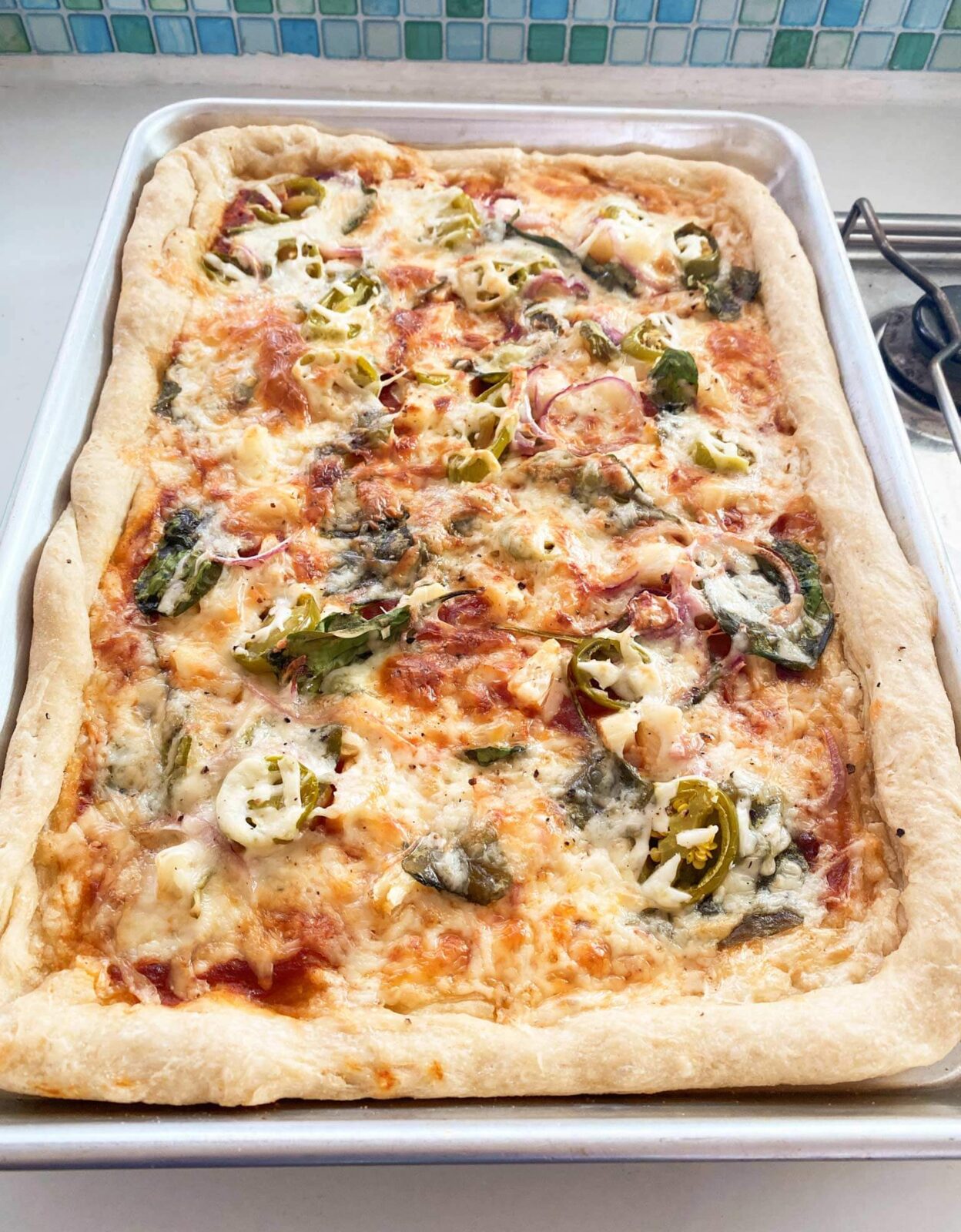 pizza with pineapple and jalapeno