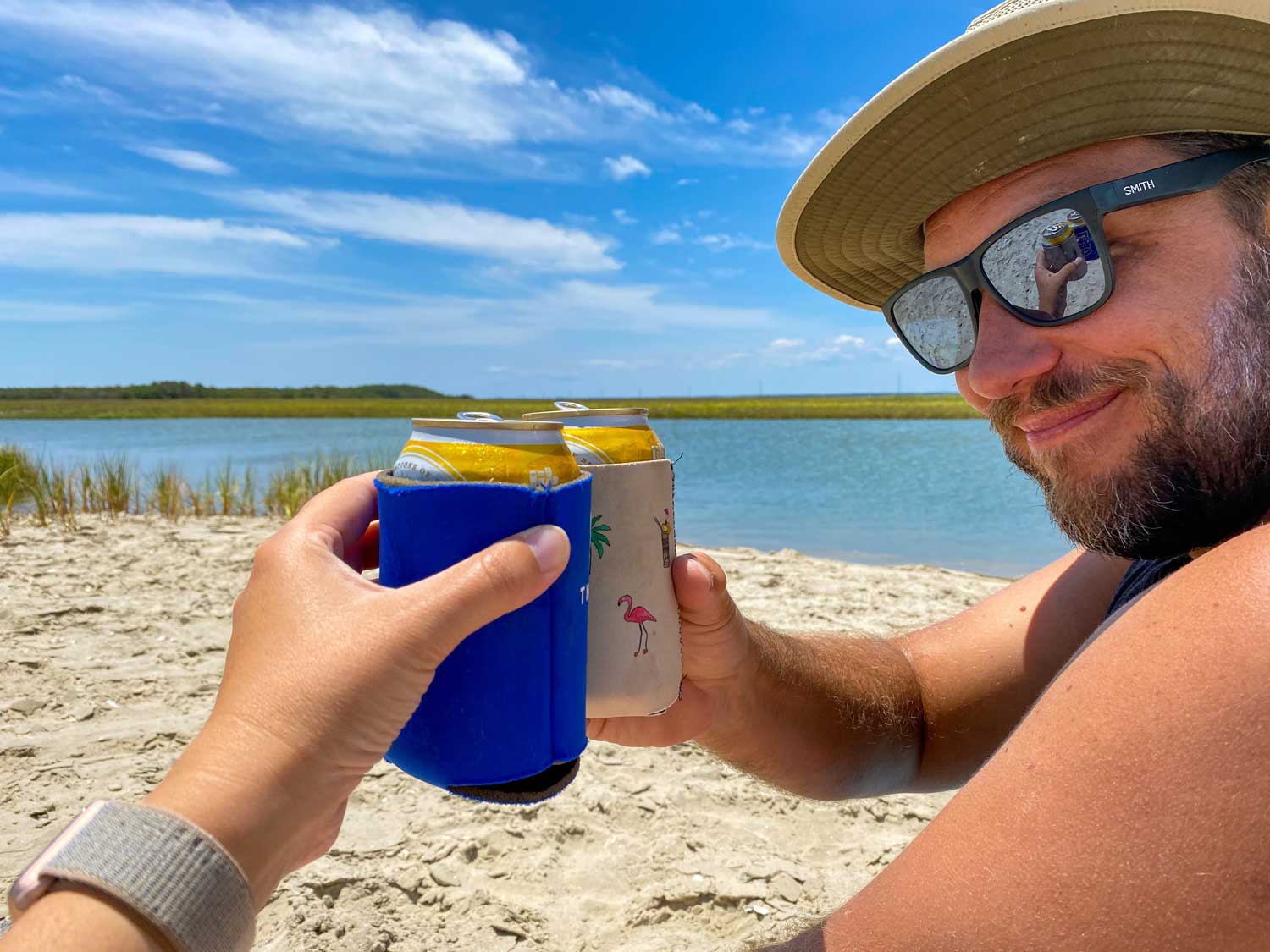Sunnyside crew on beach with beers