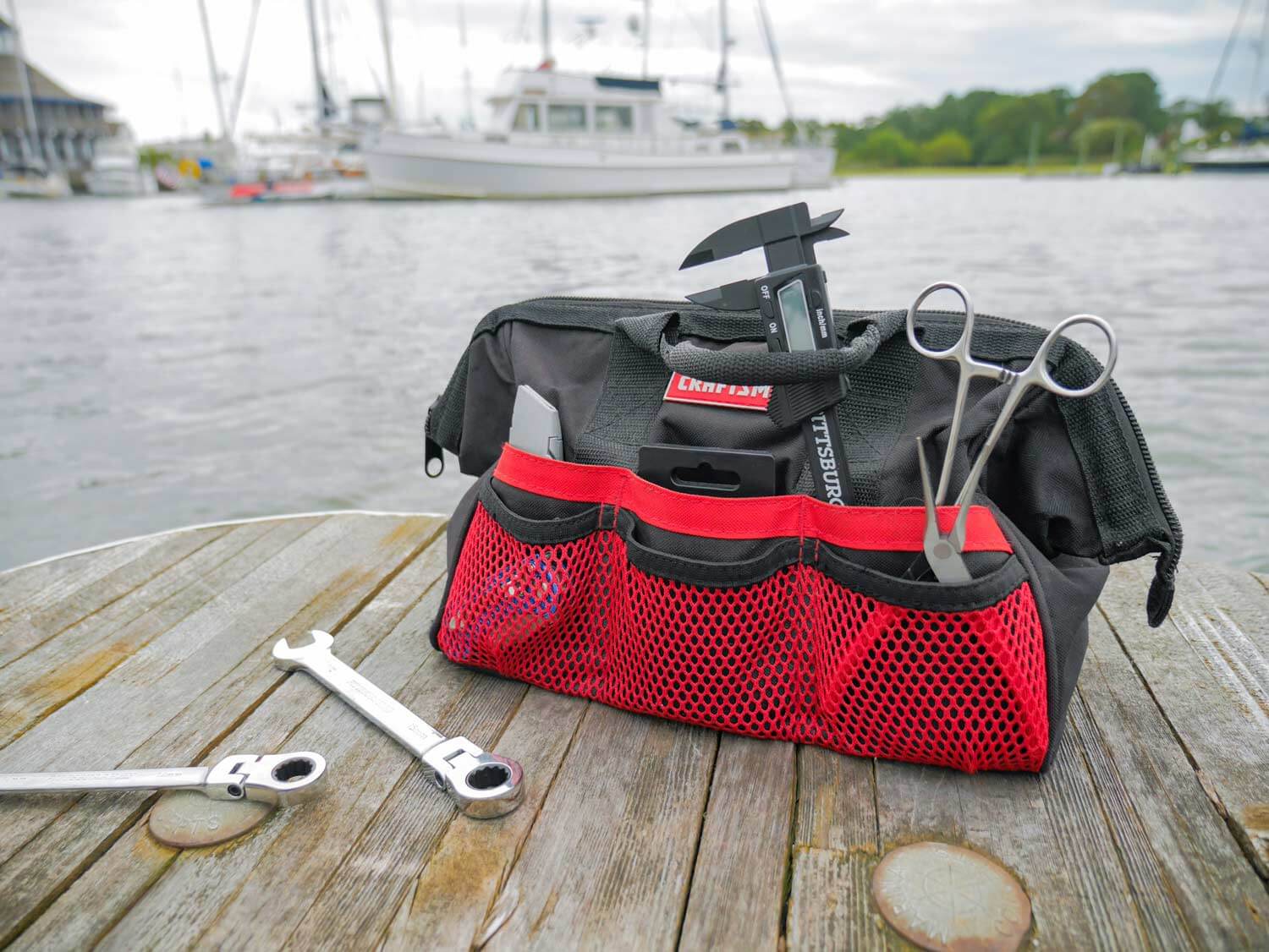 tool bag on boat dock at marina