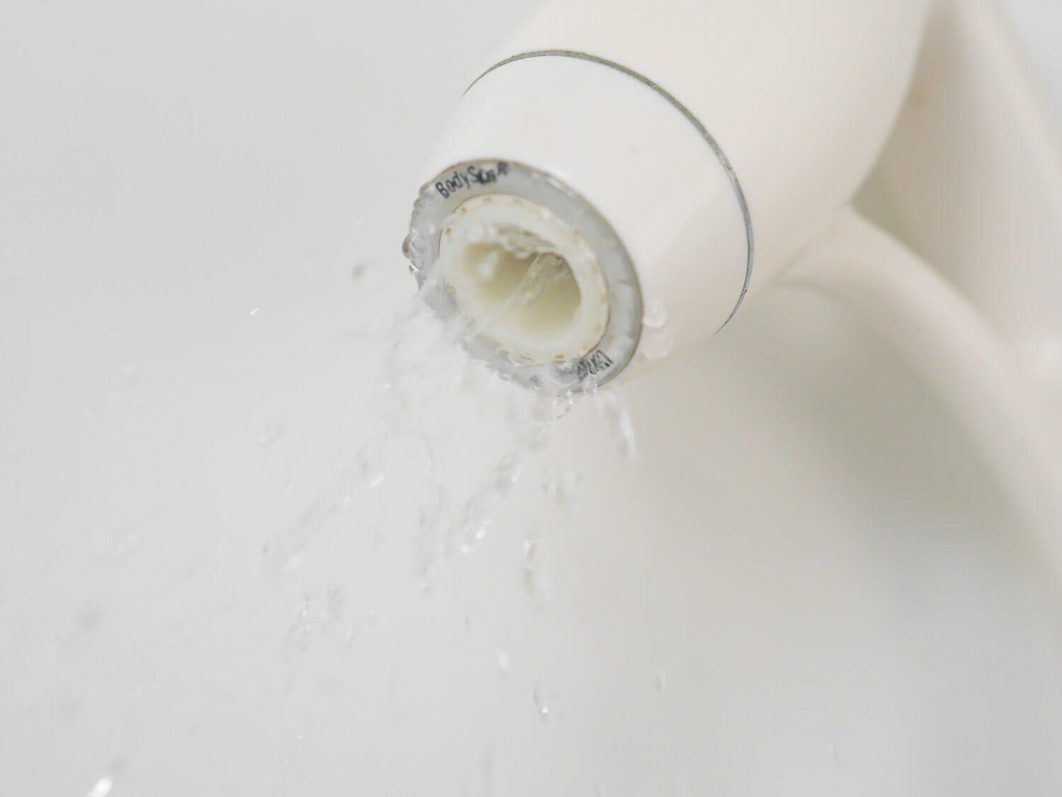 water running from shower head