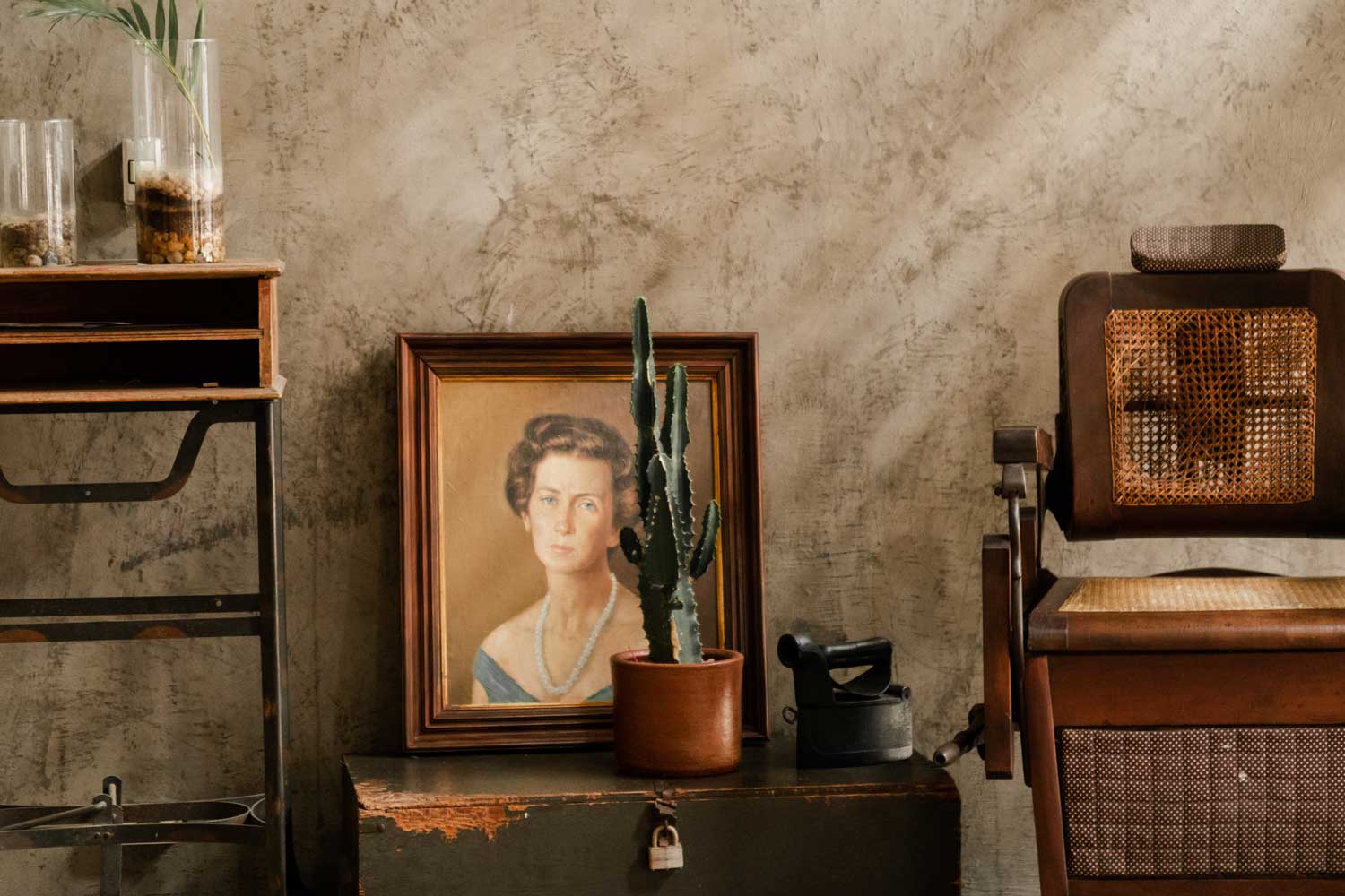 Trunks, vintage chairs, and old paintings