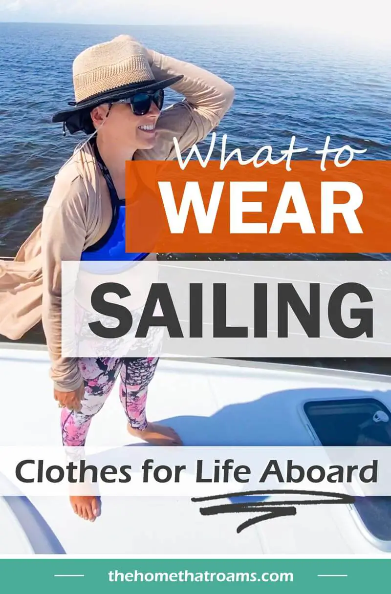 pin of woman standing on bow of catamaran in sailing clothes