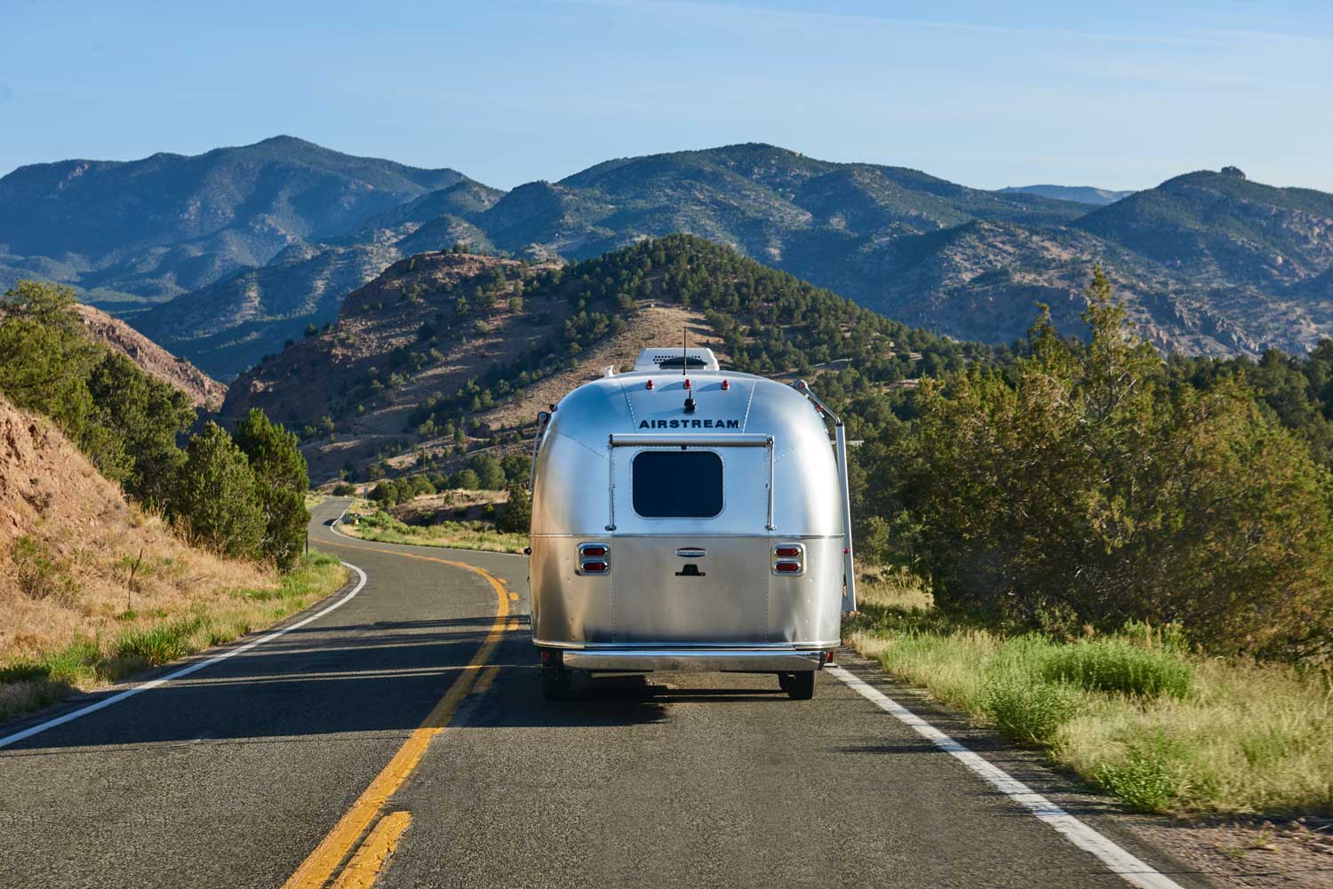 Airstream on a mountain road