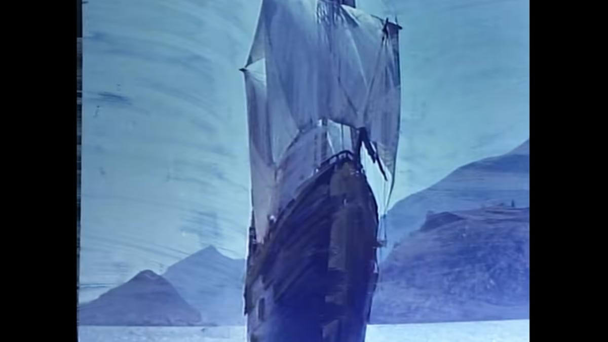 Sailboat on the ocean in Enya's video Sail Away.