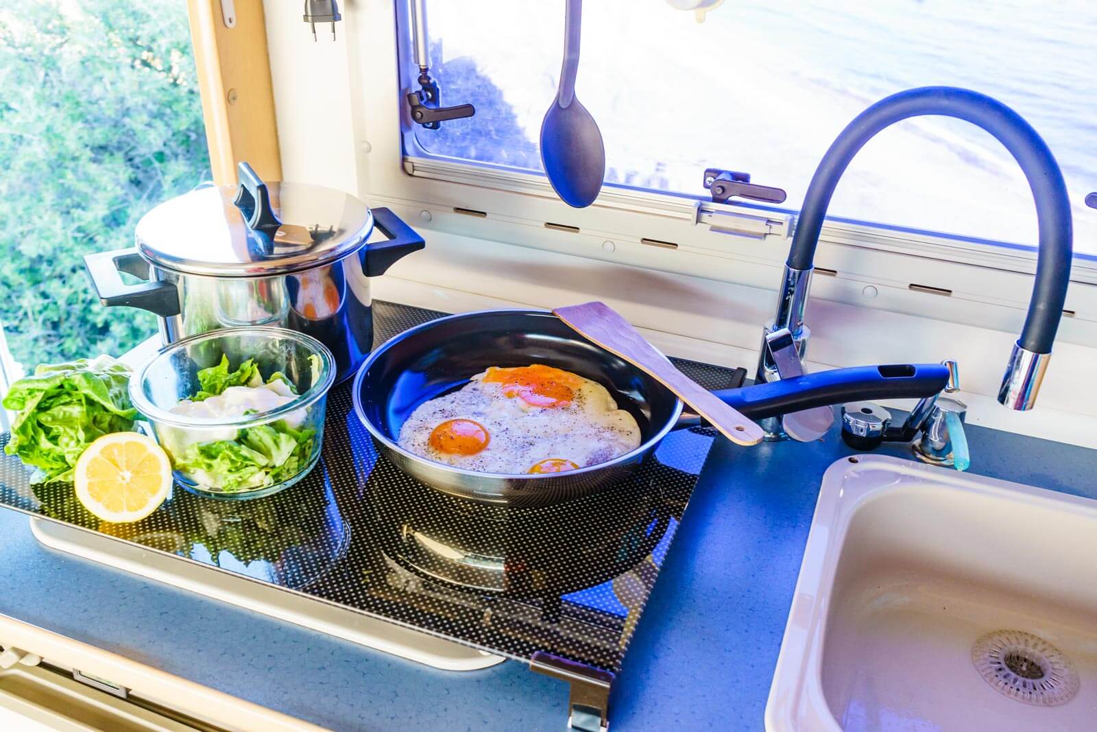 cooking a meal on an RV stove