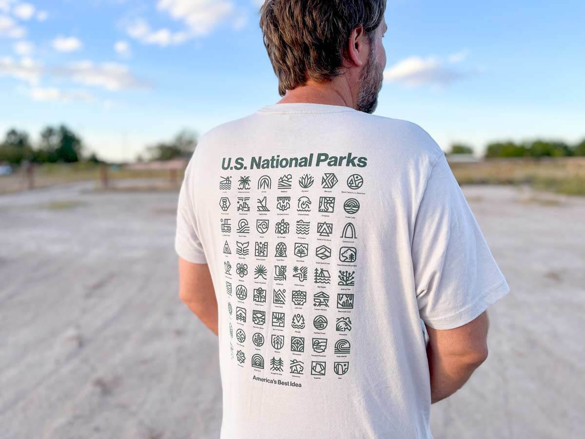 Man wearing National Park t-shirt with design on the back.