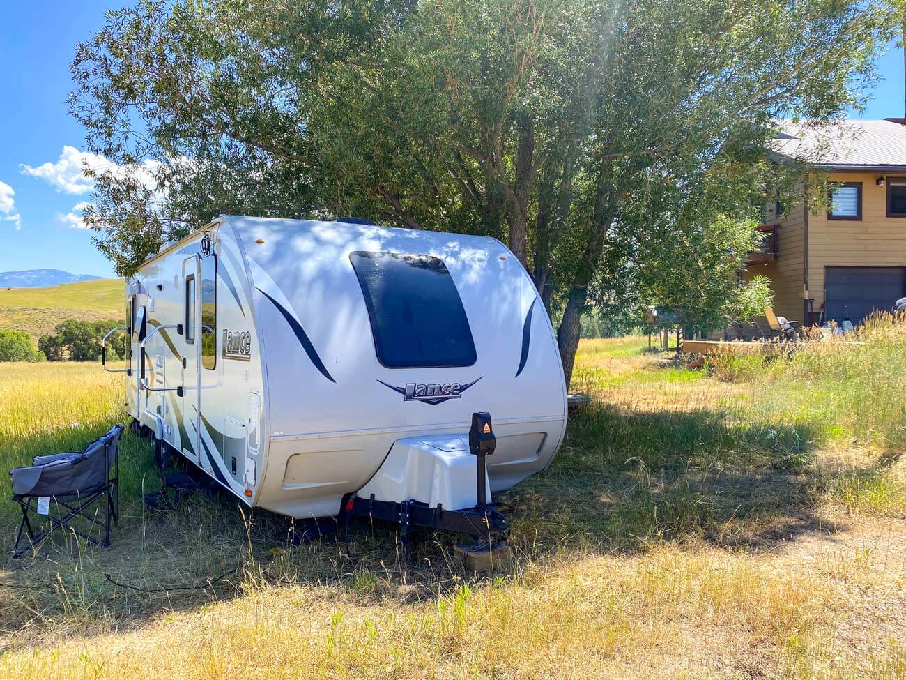 RV parked behind a house on private land