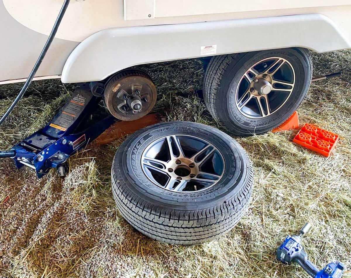 tire removed from RV travel trailer for leak repair