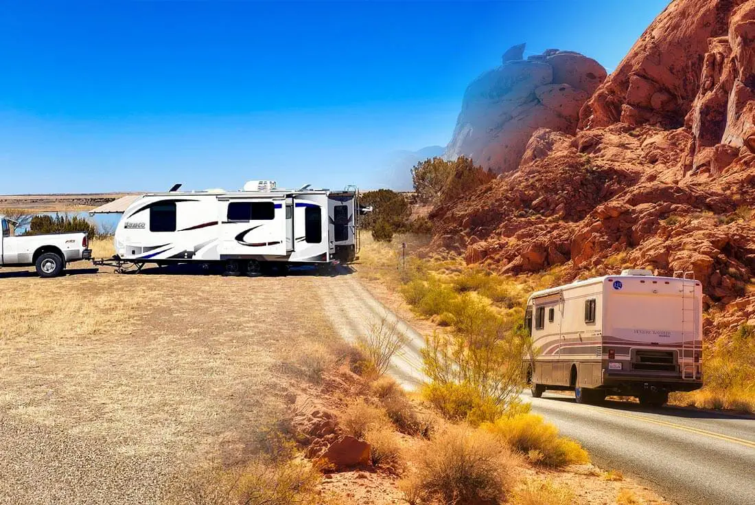 travel trailer hooked up to truck and motorhome driving down a highway in the desert
