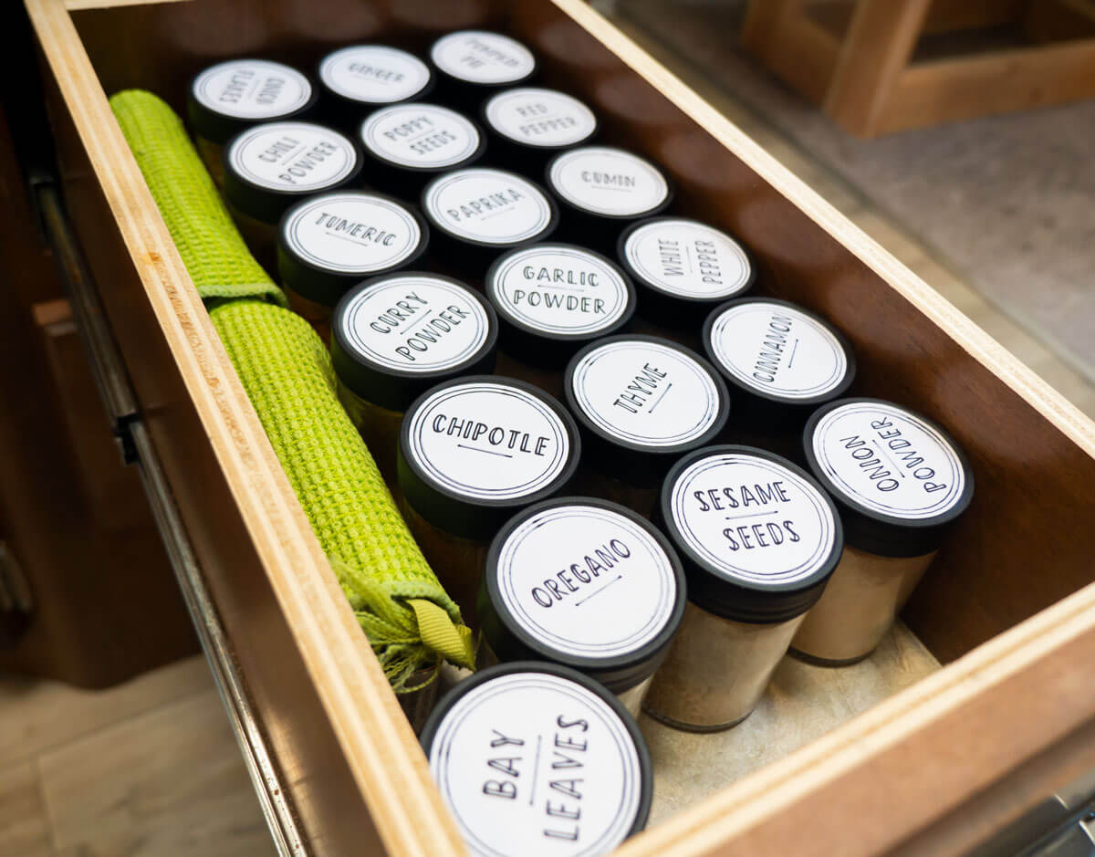 spice jars organized in RV kitchen drawer