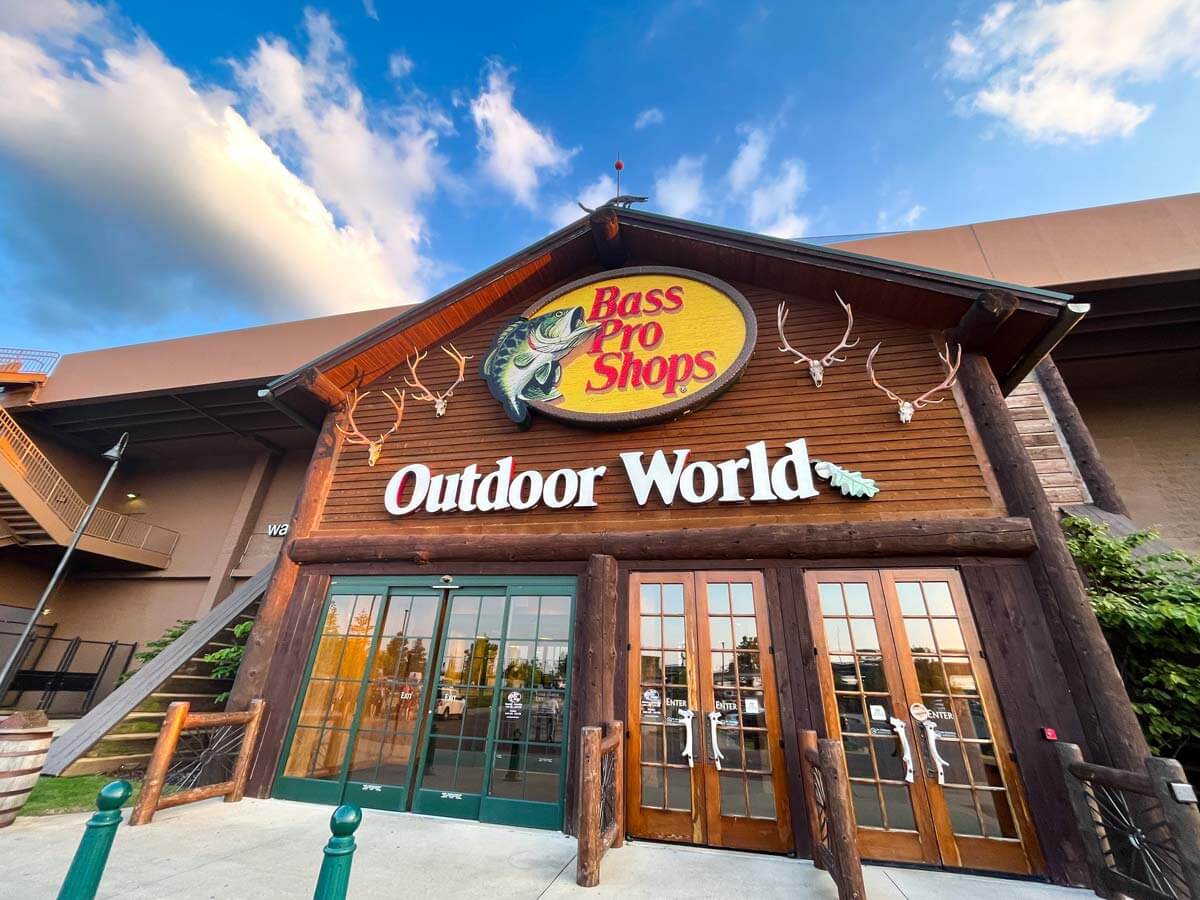 Outdoor sign and entrance to Bass Pro Shop.