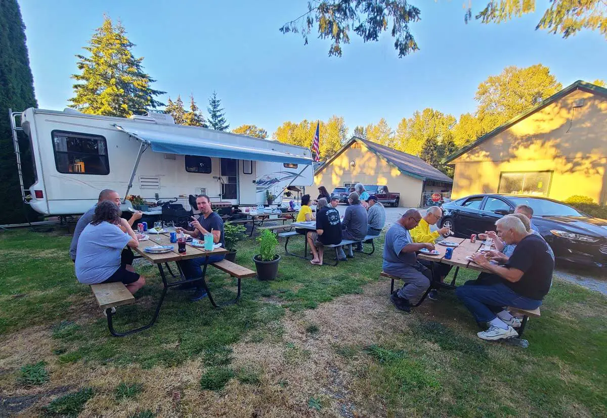 Workampers enjoying dinner together at the campground.