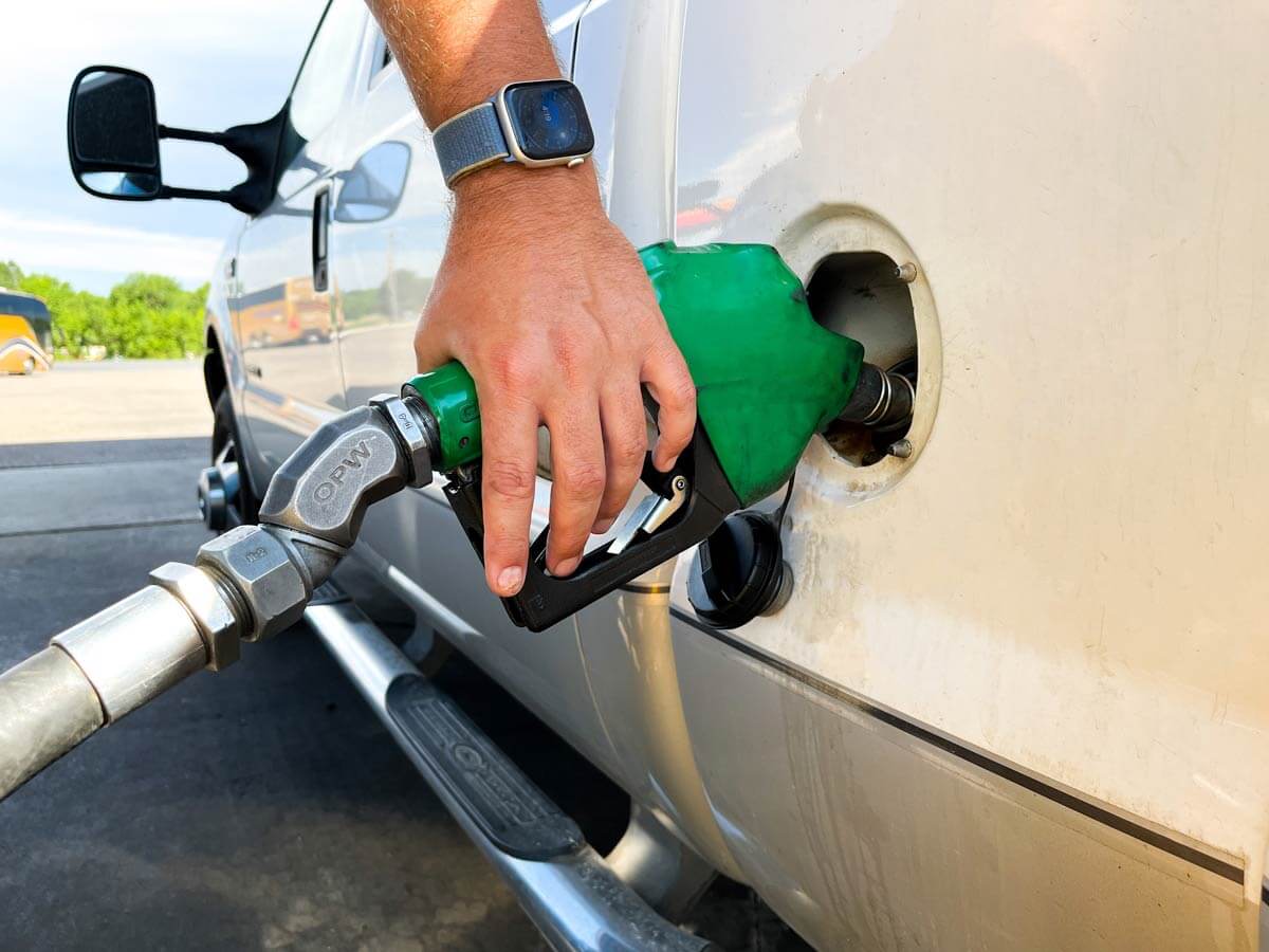 Close up of fuel being pumped into a diesel truck.