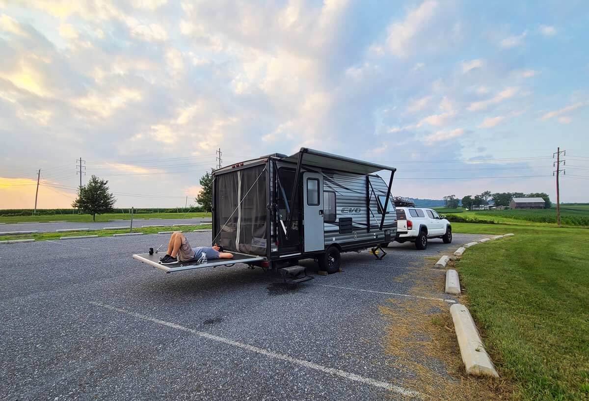 Ramp down on the back of a toy hauler travel trailer.